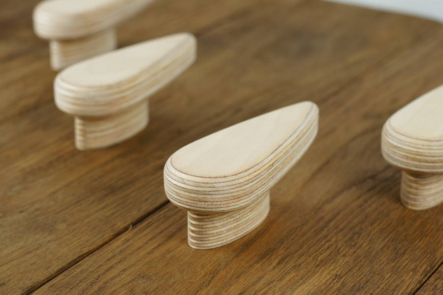 a set of strong wooden coat hooks in birch ply by obe & co design