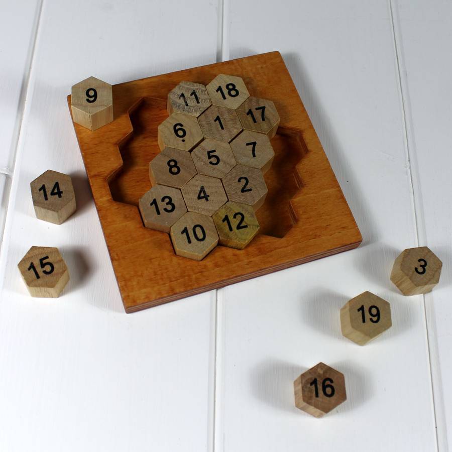 aristotles wooden number puzzle by nest | notonthehighstreet.com