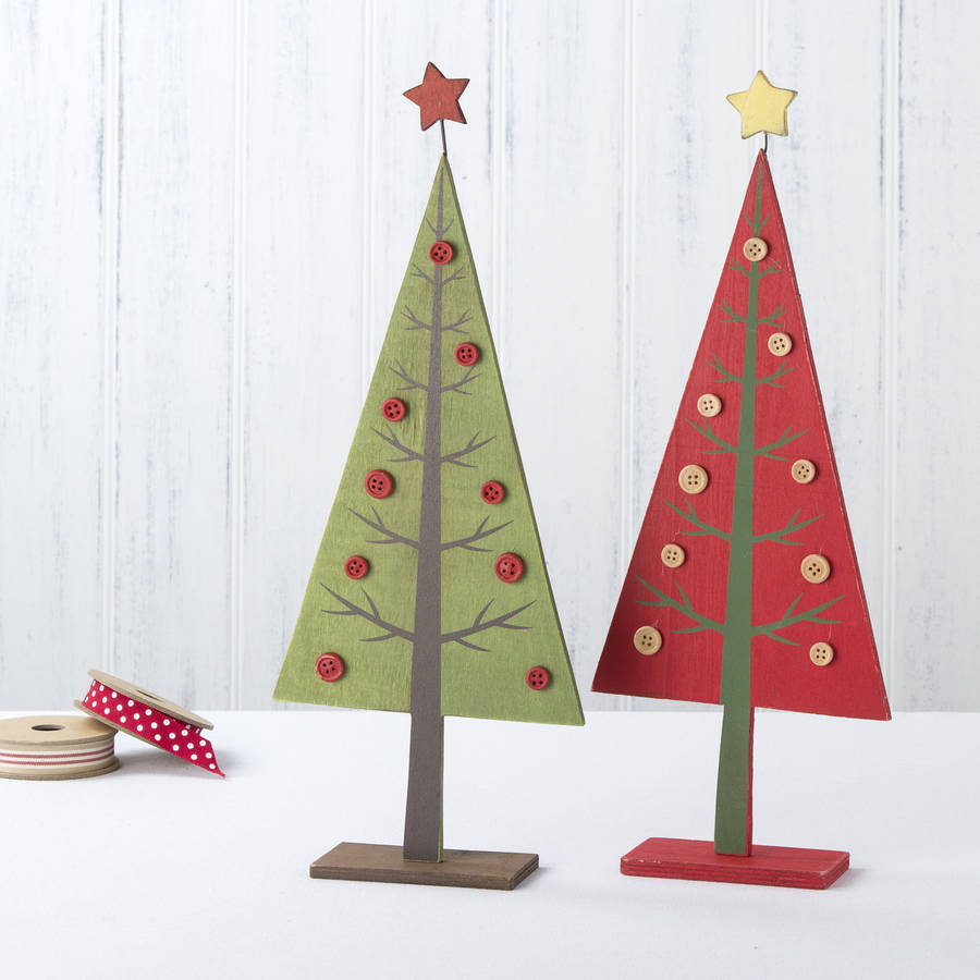 Red wooden tabletop christmas tree by the christmas home 