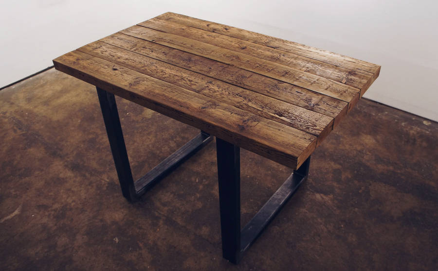 'morillo' reclaimed wood dining table with steel legs by revive joinery