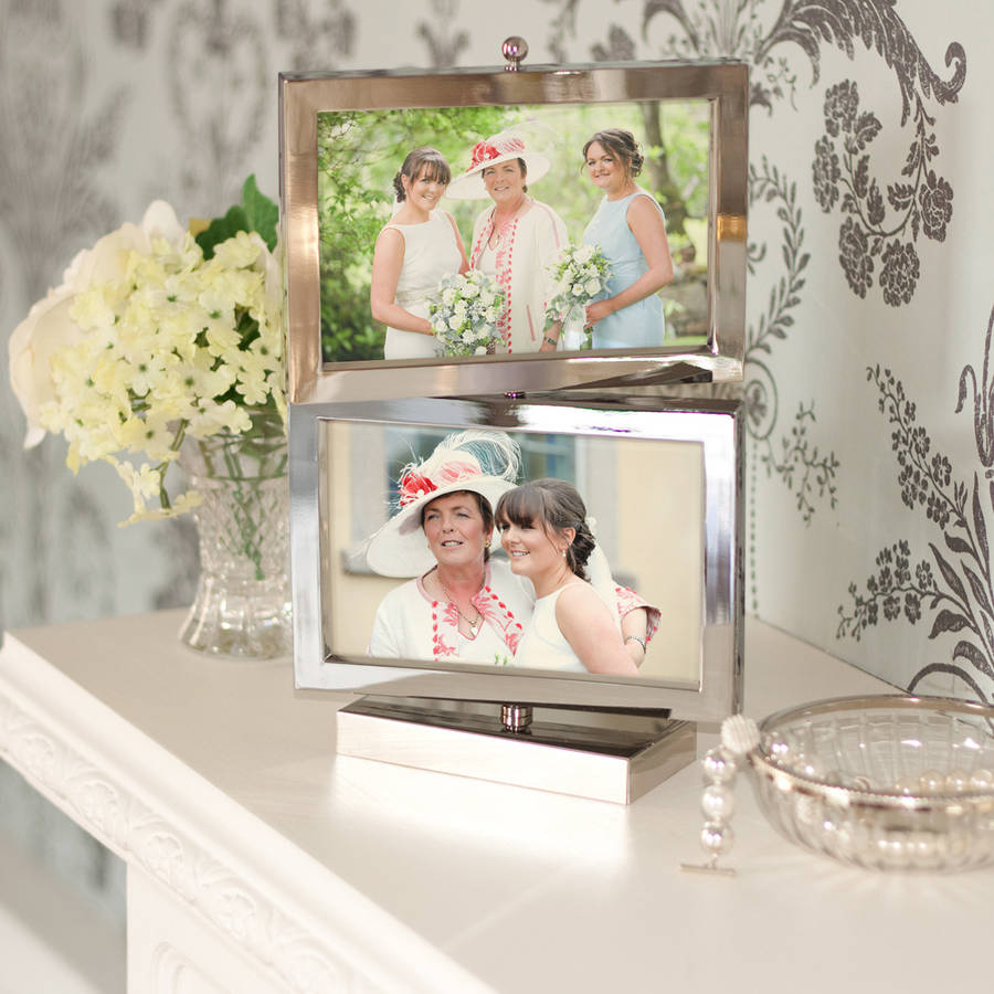 rotating silver multi aperture picture frame by jodie byrne