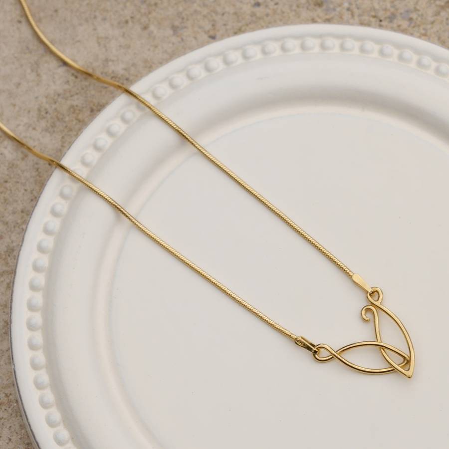 contemporary gold leaf earrings and necklace set by louise mary designs