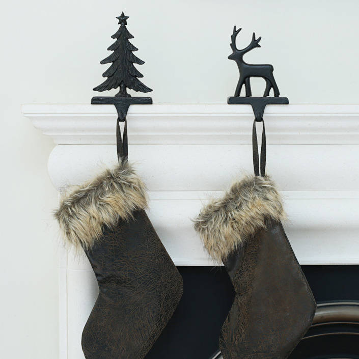 cast iron reindeer or tree stocking holder by ella james