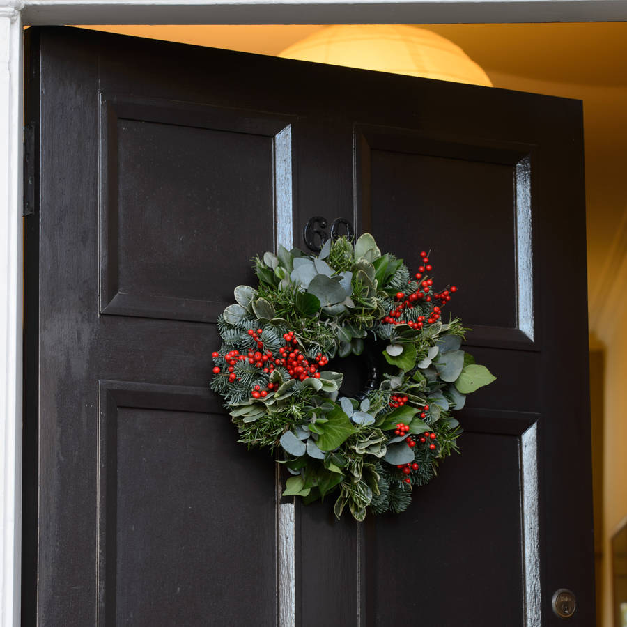 woodland fresh foliage and berry door wreath by the flower studio