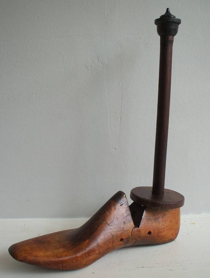 shoe last toilet/kitchen roll holder by housekeeping