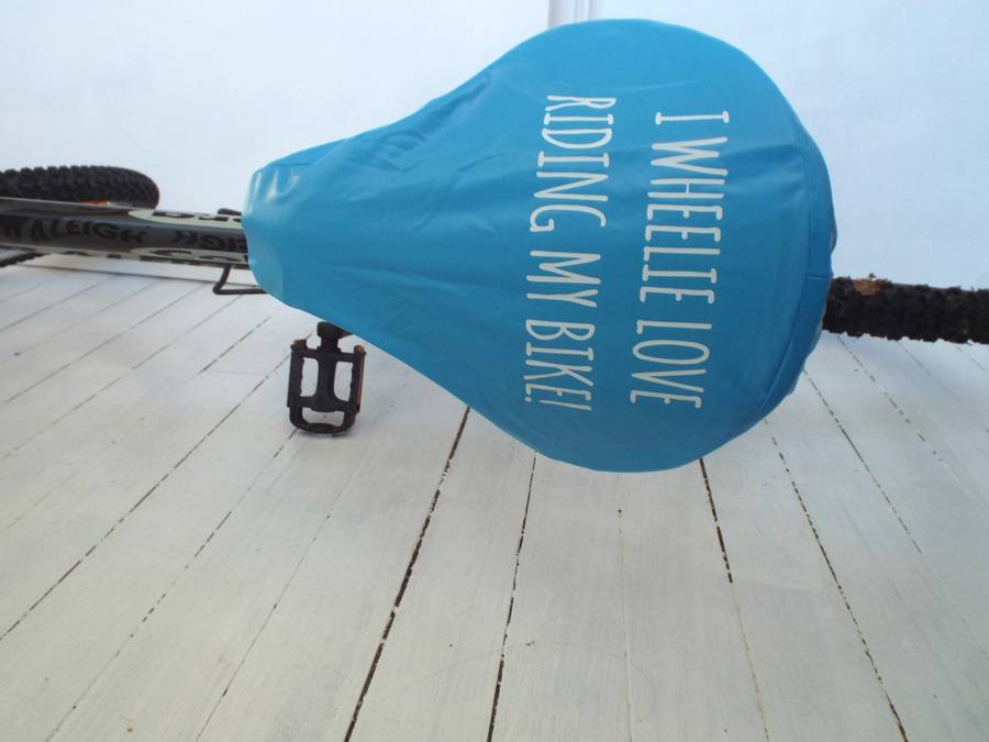 'wheelie love' bike seat rain cover by kelly connor designs