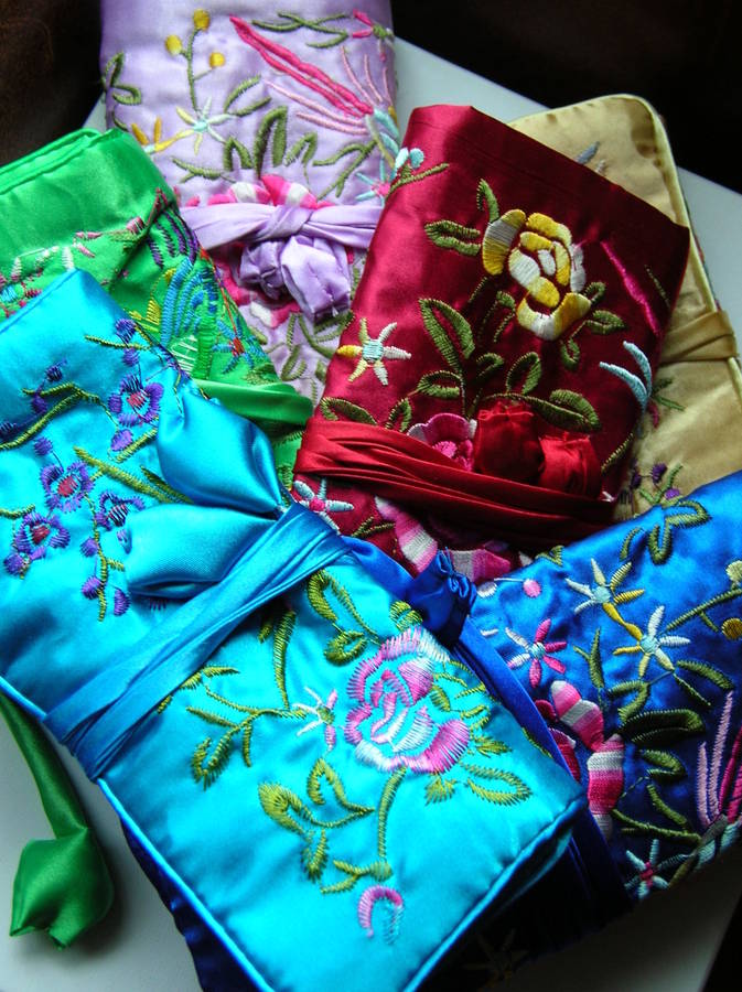 silk embroidered jewellery roll by plum & ivory