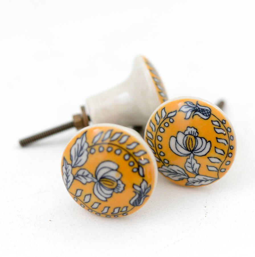 yellow and black door knob by the forest & co