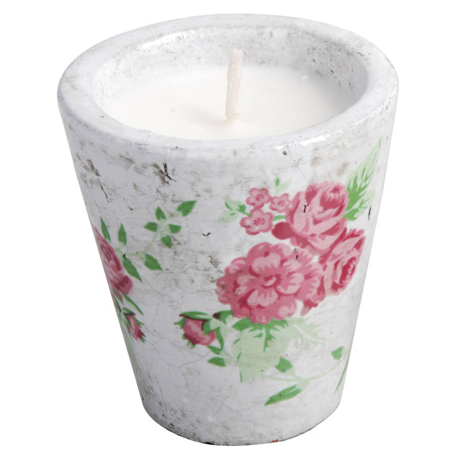 decorative candle in a ceramic pot by garden selections