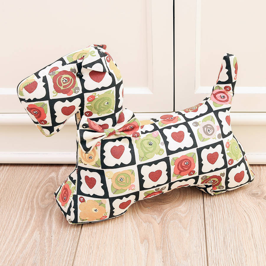 vintage print dog door stop by dibor