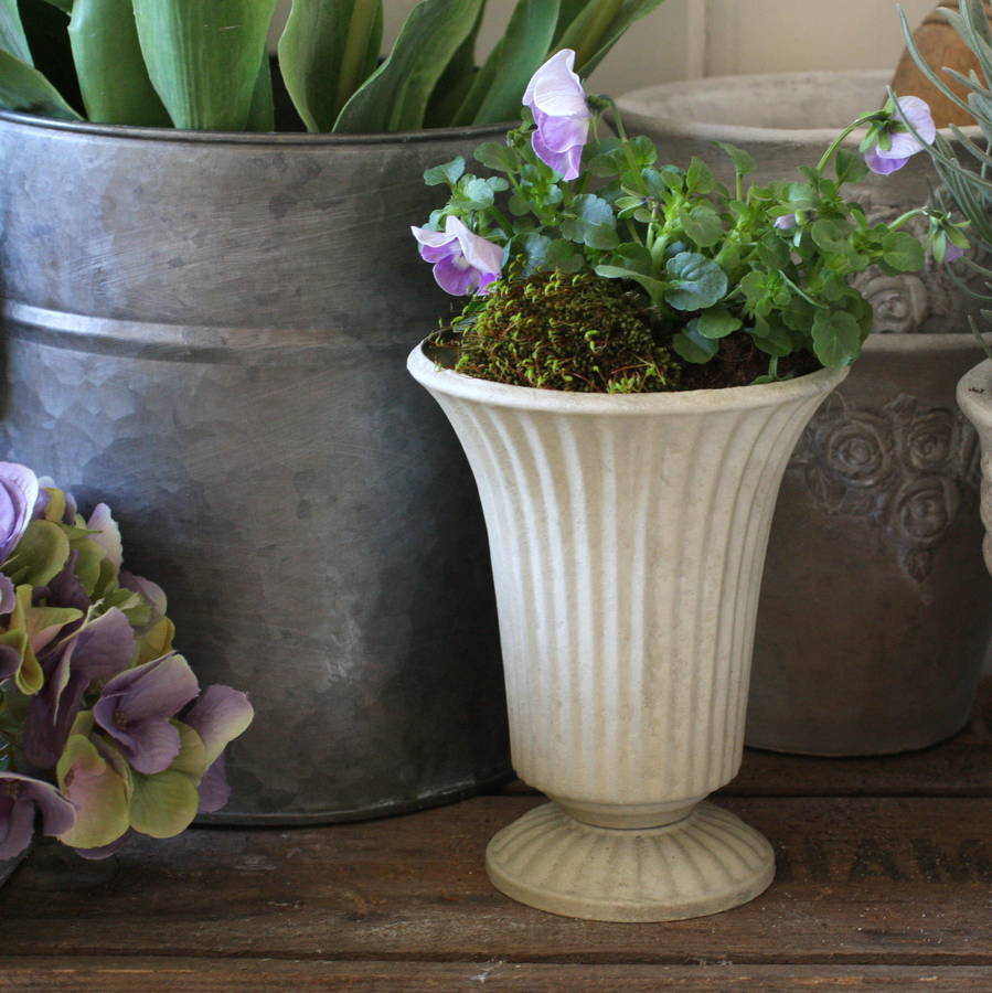 cream metal urn by magpie living