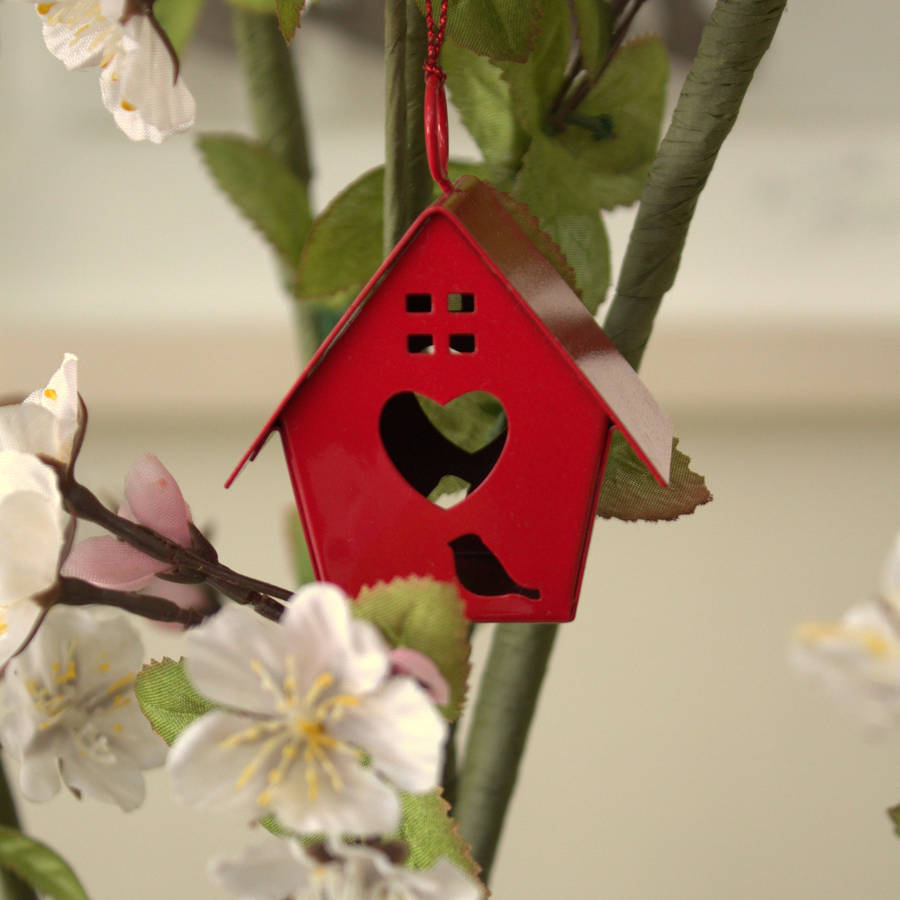 red birdhouse decoration by ella james