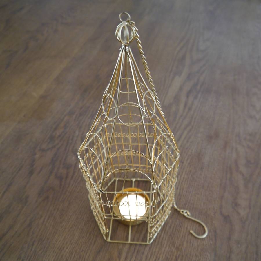 brass birdcage hanging tealight holder by deservedlyso