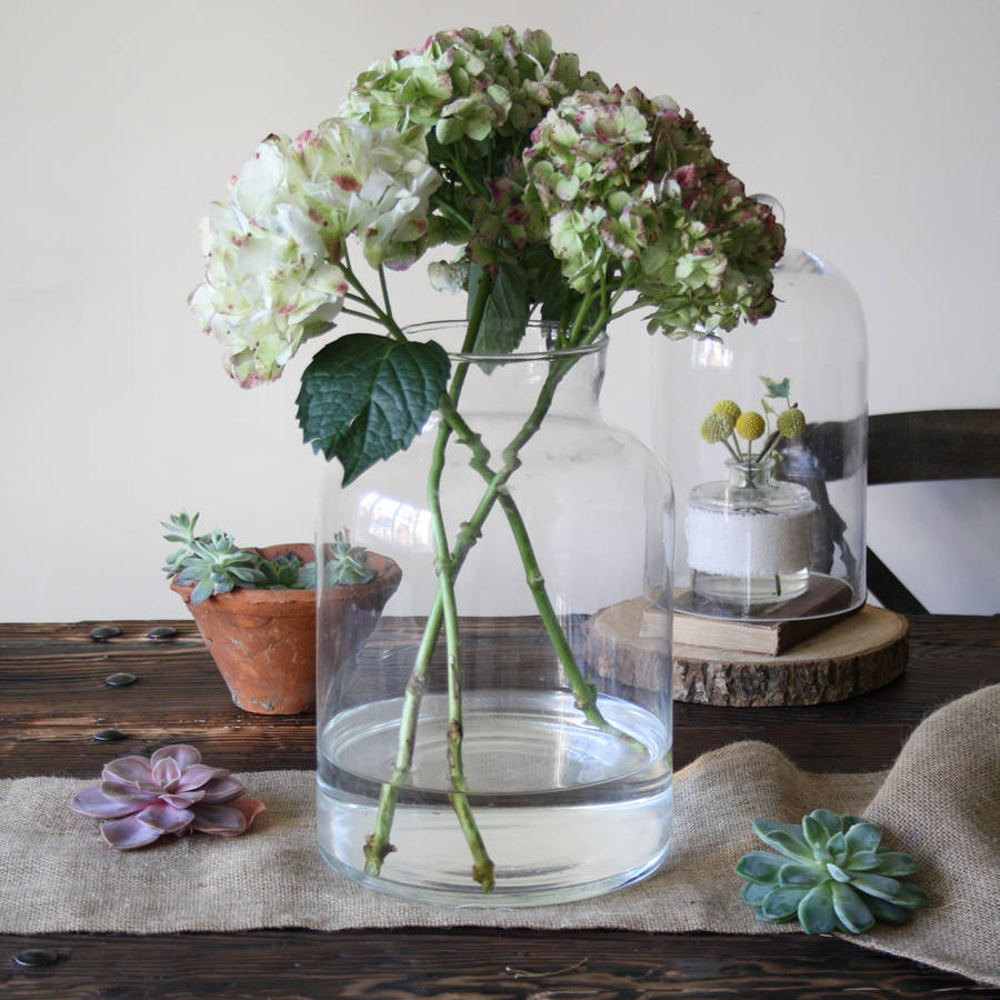 clear glass carboy vase by the wedding of my dreams