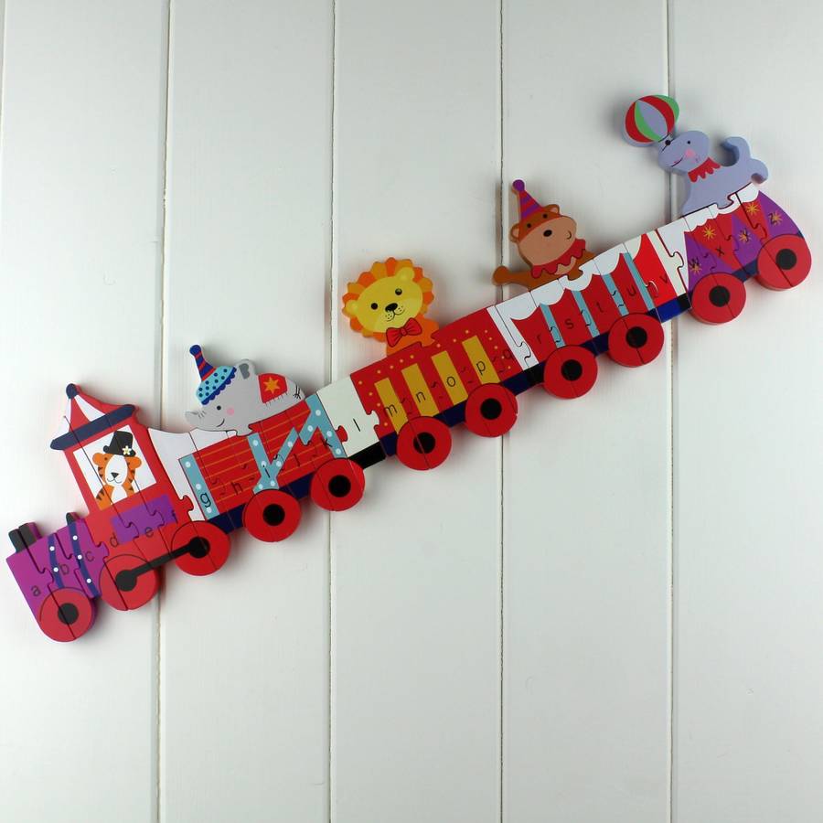 circus animal alphabet jigsaw puzzle train by nest | notonthehighstreet.com