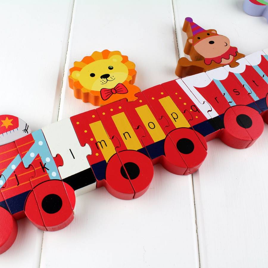 circus animal alphabet jigsaw puzzle train by nest | notonthehighstreet.com