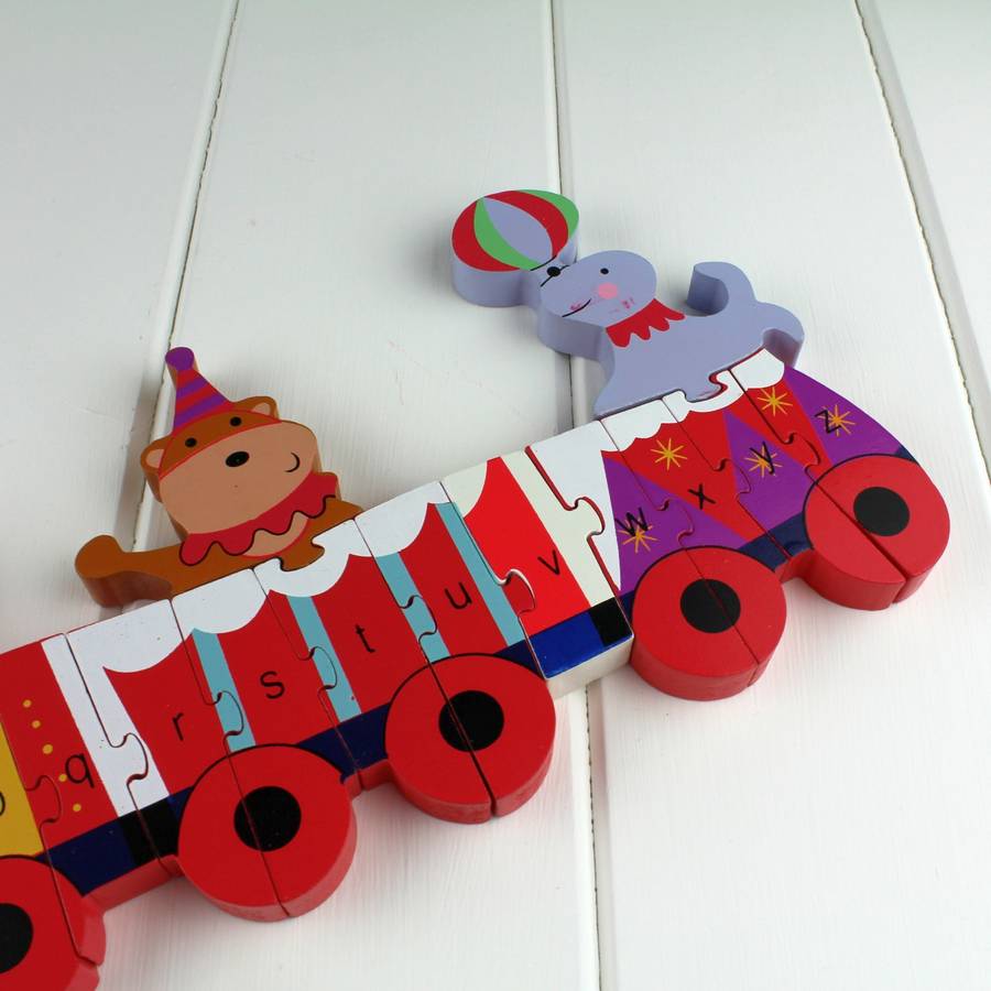 circus animal alphabet jigsaw puzzle train by nest | notonthehighstreet.com