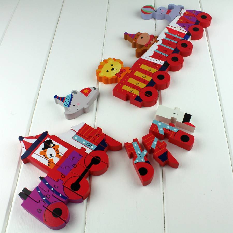 circus animal alphabet jigsaw puzzle train by nest | notonthehighstreet.com