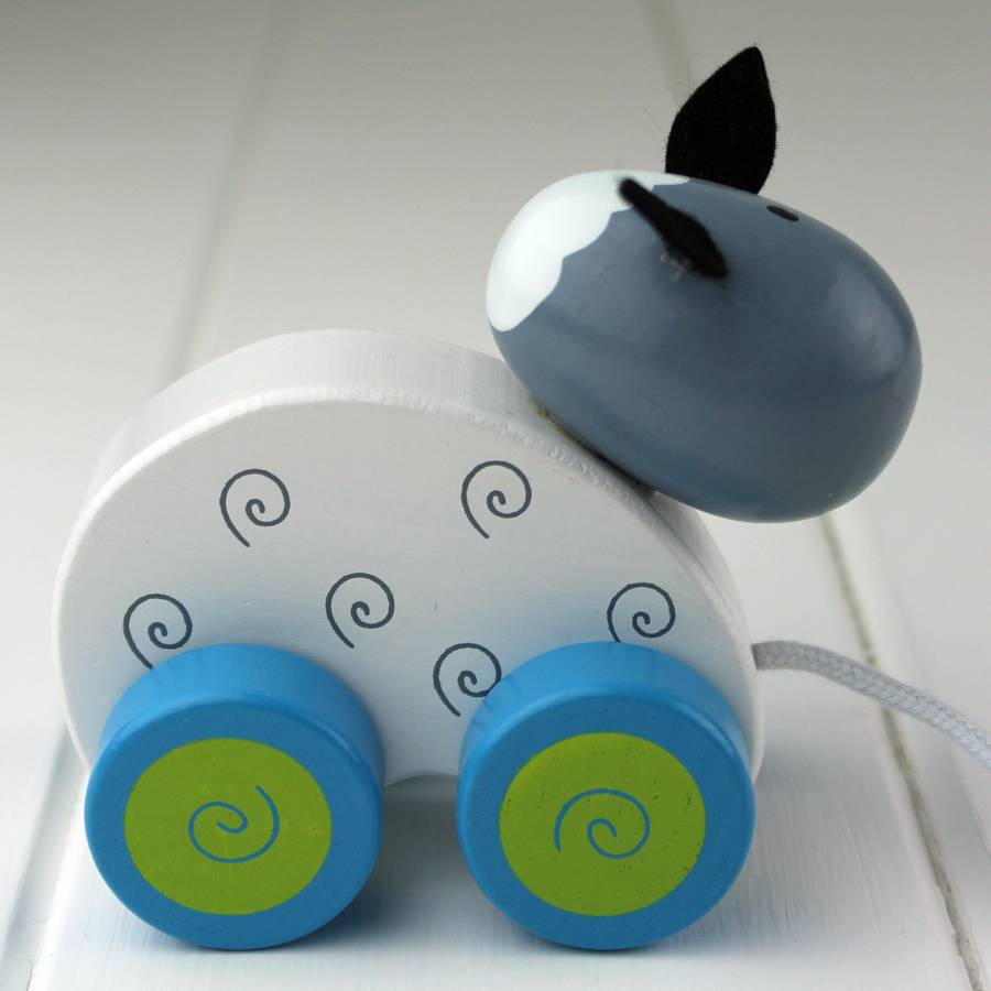 hand painted wooden sheep pull along by nest