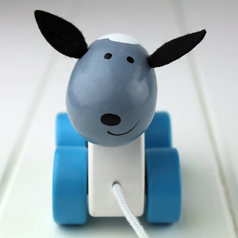 hand painted wooden sheep pull along by nest