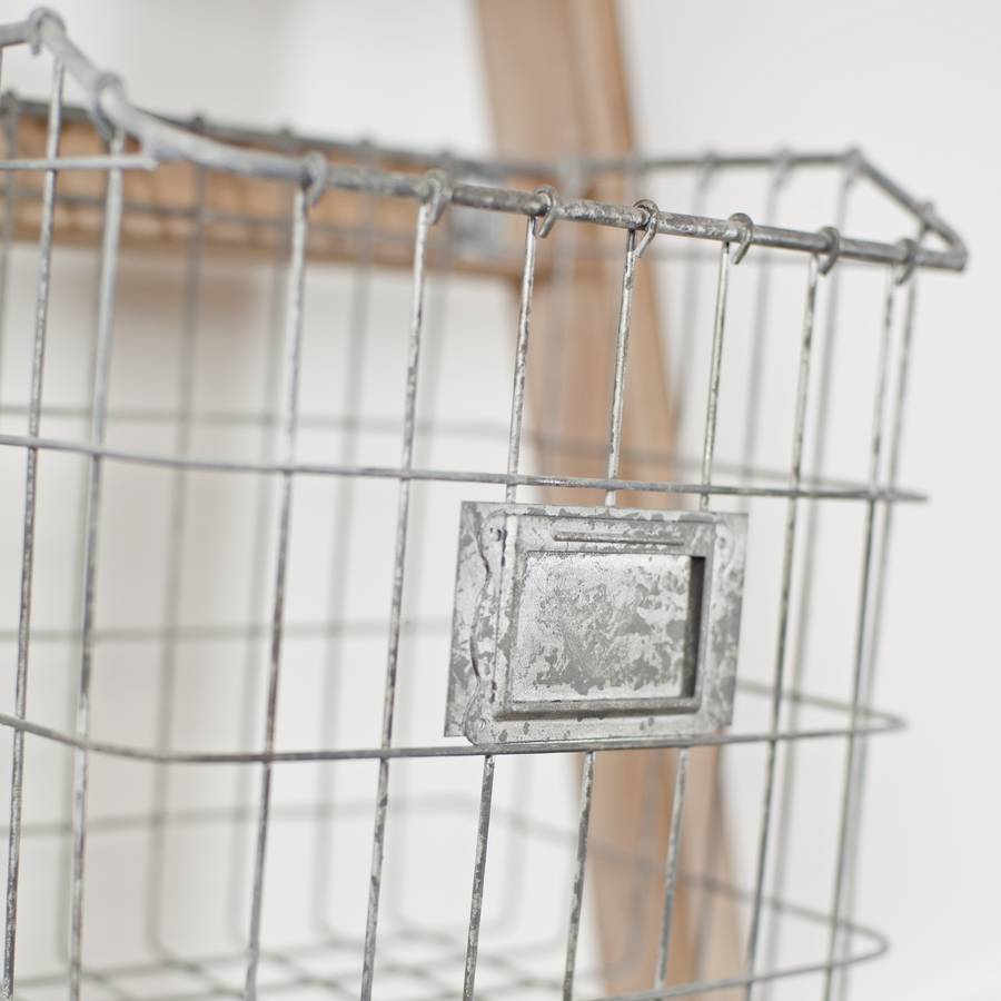 wooden ladder with five storage baskets by the orchard