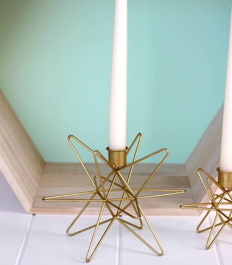 large brass star shaped candle holder by posh totty designs interiors