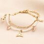 Stainless Steel Double Layer Dolphin Charm Bracelet In Gold, thumbnail 1 of 3