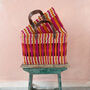 Decorative Reed Basket, Pink And Orange Stripe, thumbnail 2 of 6