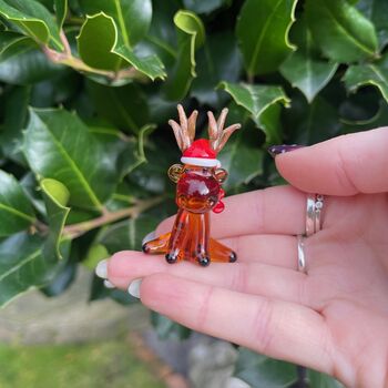 Hand Blown Glass Reindeer With Santa Hat, 6 of 6