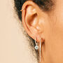 Guiding North Star Emerald Silver/Gold Huggie Hoops, thumbnail 1 of 7