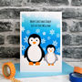 'Penguin And Baby' Personalised Christmas Card, thumbnail 1 of 4