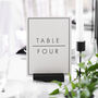 Black And White Wedding Table Numbers Holders And Cards, thumbnail 1 of 4