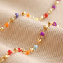 Rainbow Beaded Feather Charm Necklace In Gold Plating, thumbnail 4 of 7