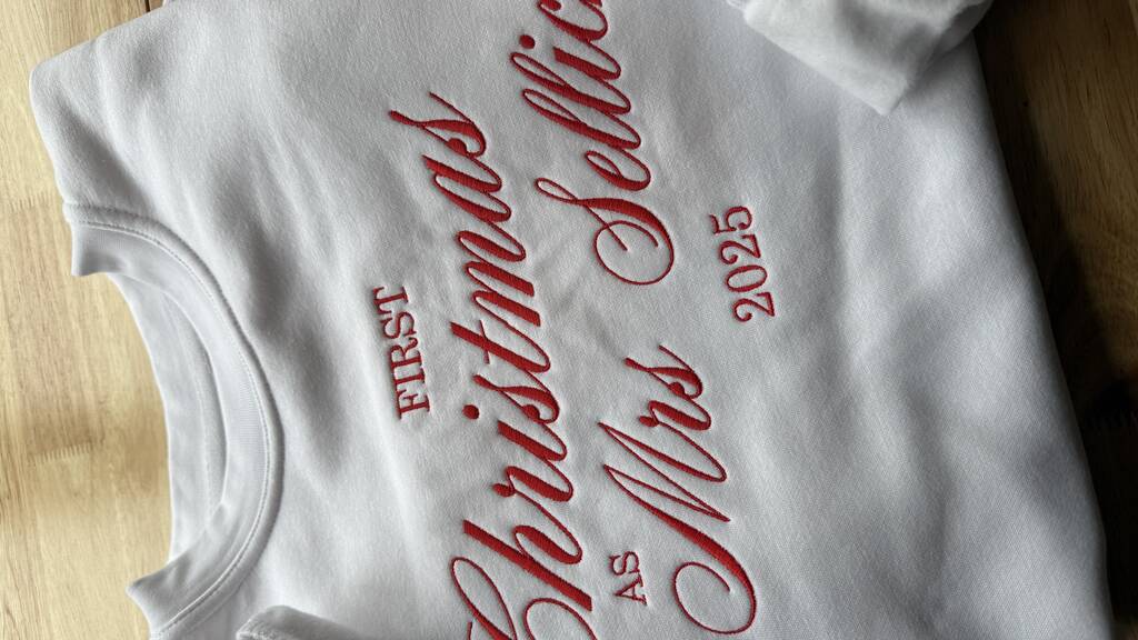 Custom Embroidered 'First Christmas As Mrs…' Personalised Surname Sweatshirt, 1 of 4