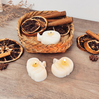 Set Of Three White Pumpkin Tea Light Candles, 3 of 10
