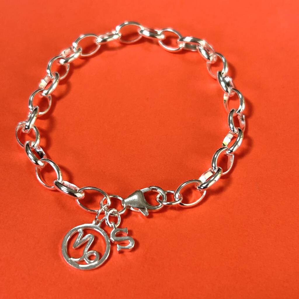 Sterling Silver Zodiac Capricorn Initial Charm Bracelet, 1 of 3