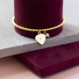 Gold Plated Heart Star And Pearl Charm Bracelet, thumbnail 3 of 6