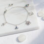 Peace Love And Freedom Sterling Silver / Gold Vermeil Charm Bracelet, thumbnail 1 of 8