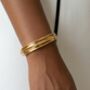 Nami 18 K Gold Plated Twist Bangle, thumbnail 5 of 5
