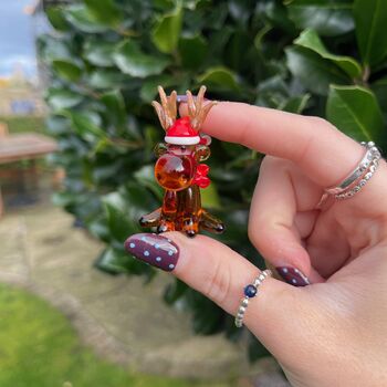 Hand Blown Glass Reindeer With Santa Hat, 4 of 6