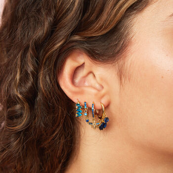 Lola Blue Gold Huggie Earrings, 2 of 2