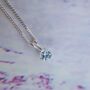 Sterling Silver Necklace With 5mm Sky Blue Topaz Pendant, thumbnail 2 of 4