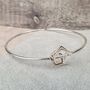 Sterling Silver Bangle With Geometric Charms, thumbnail 1 of 10
