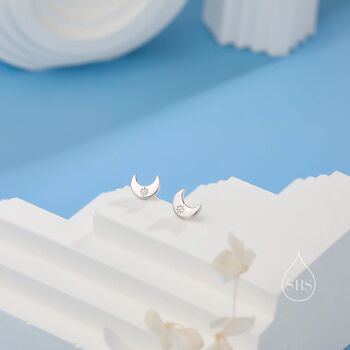 Tiny Moon With Starburst Stud Earrings Sterling Silver, 2 of 11