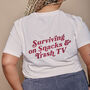 Snacks And Trash Tv Slogan Organic T Shirt, thumbnail 1 of 5