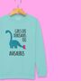 'Girls Like Dinosaurs Too' Personalised Girls Sweatshirt, thumbnail 1 of 12