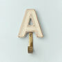 Alphabet Cream Crackle Glazed Hooks In Antique Brass, thumbnail 2 of 9