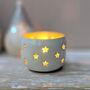 Cream Tea Light Holder With Cut Out Stars, thumbnail 1 of 2