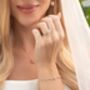 Two Ct Round Moissanite Three Stone Engagement Ring, thumbnail 2 of 9