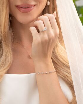 Two Ct Round Moissanite Three Stone Engagement Ring, 2 of 9